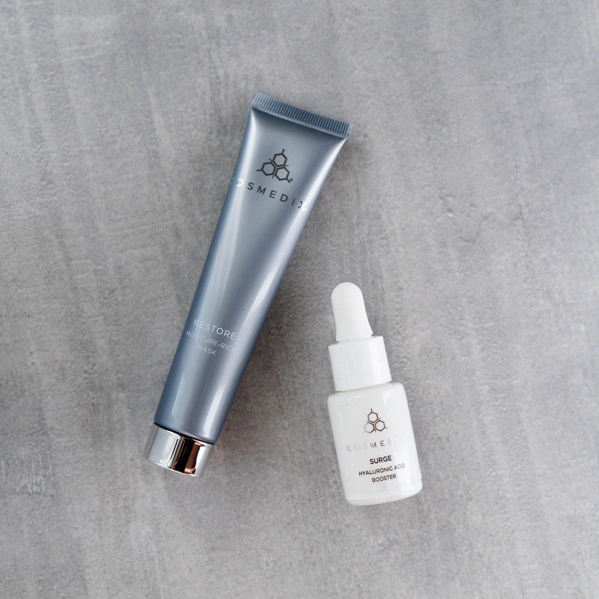 ultimate-hydration-kit-surge-hyaluronic-acid-booster-118-ml-restore-moisture-rich-mask-3685g-limited-edition-travel-kits-cosmedix-334011_1800x1800